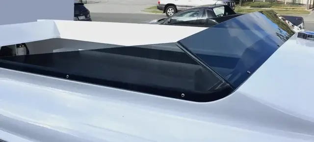 Custom curved boat screen — tinted acrylic
