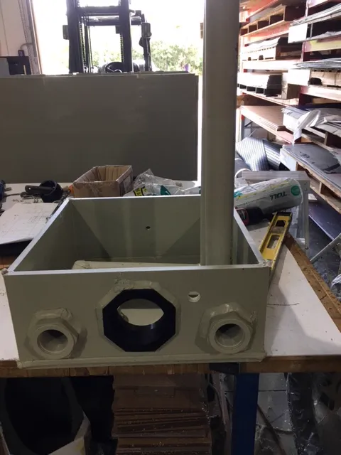 Thermoformed plastic enclosure with pipe fittings