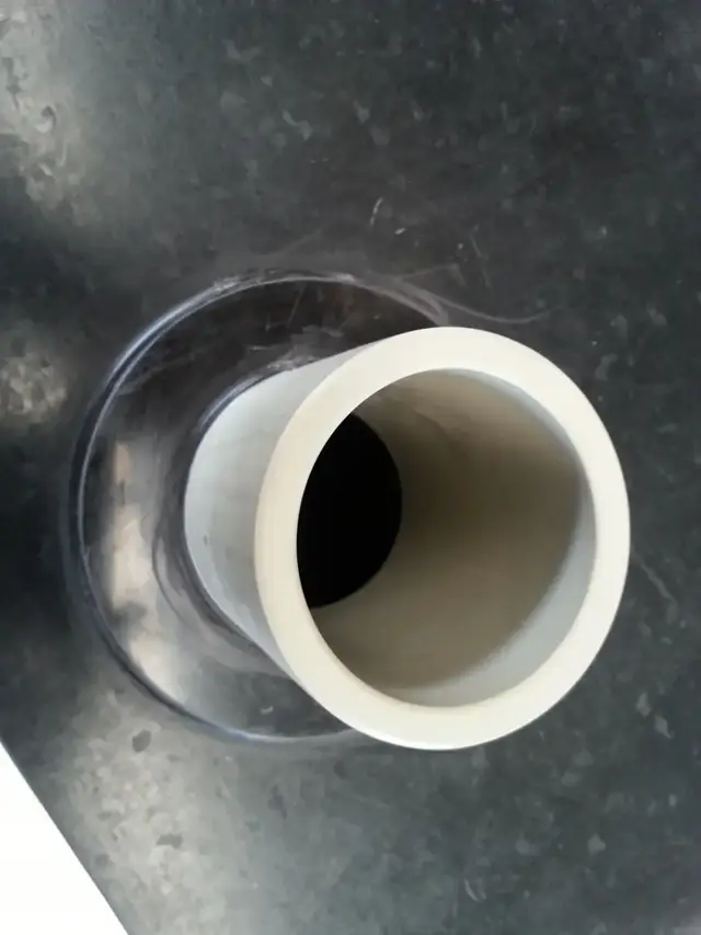 Close-up of extrusion-welded nozzle connection