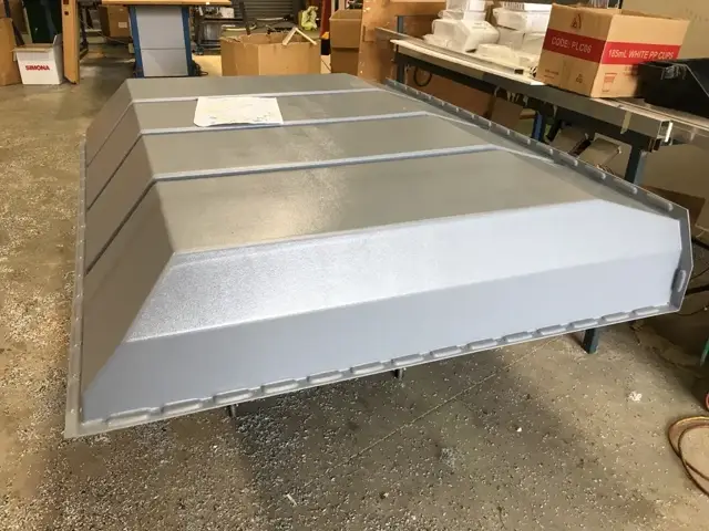Custom plastic cover for emergency vehicle equipment